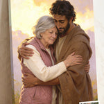 Personalized Jesus of Nazareth Hug Portrait canvas of an older woman held close in Jesus’ embrace in golden sunrise light, with a small print of her original photo